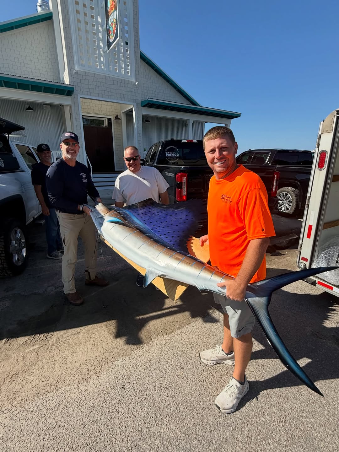 A mounted sailfish carried in front of the Ralphie's building.